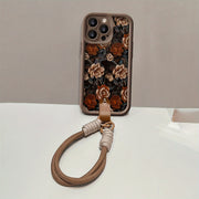 Vintage Flower with Hand Strap Brown Shockproof Frosted Full Cover Anti-Fall Mobile Phone Case Suitable for Apple 16PROMAX/16PLUS/16PRO/16/15PROMAX/15PLUS/15PRO/15/14PROMAX/14PLUS/14PRO/14/13PROMAX/13PRO/13/12PROMAX/12PRO/12