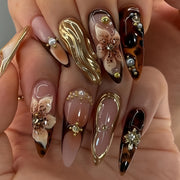24pcs set of almond-shaped false nails with 3D three-dimensional wave texture and pure desire pearl flowers and sparkling rhinestones suitable for all women and girls. The box comes with nail files and jelly glue for easy app