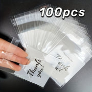 100-Pack Festive Snowflake "Thank You" Self-Seal Gift Bags, Clear OPP Packaging for Cookies, Candy, Jewelry, Office Gift Wrapping Supplies, Plastic Material, No Included Components