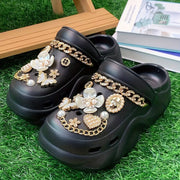 Fashionable And Trendy Women'S EVA Slip-On Shoes for Summer, Featuring Versatile And Stylish Hole Designs. The Shoes Are Adorned with White Five-Petal Flower Butterflies And Rhinestone Chains, Making Them Suitable for Home, B