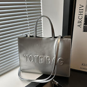 Stylish Black Tote Bag with "TOTE BAG" Embossed Design – Large Capacity Shoulder Handbag for Women, Perfect for Commuting and Casual Outings, Snap Button Closure