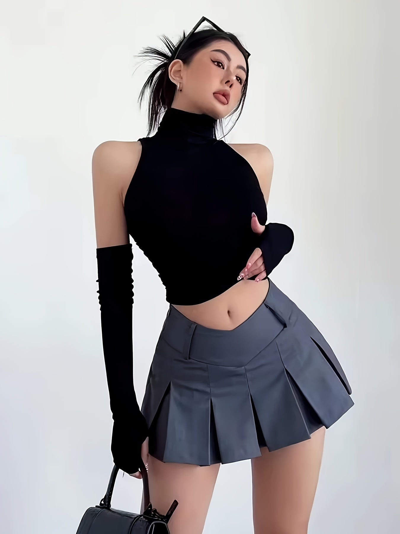 Stylish Black Pleated Mini Skirt for Women - High-Waisted, V-Leg Design, Polyester, Machine Washable, Perfect for Casual or Commuter Wear