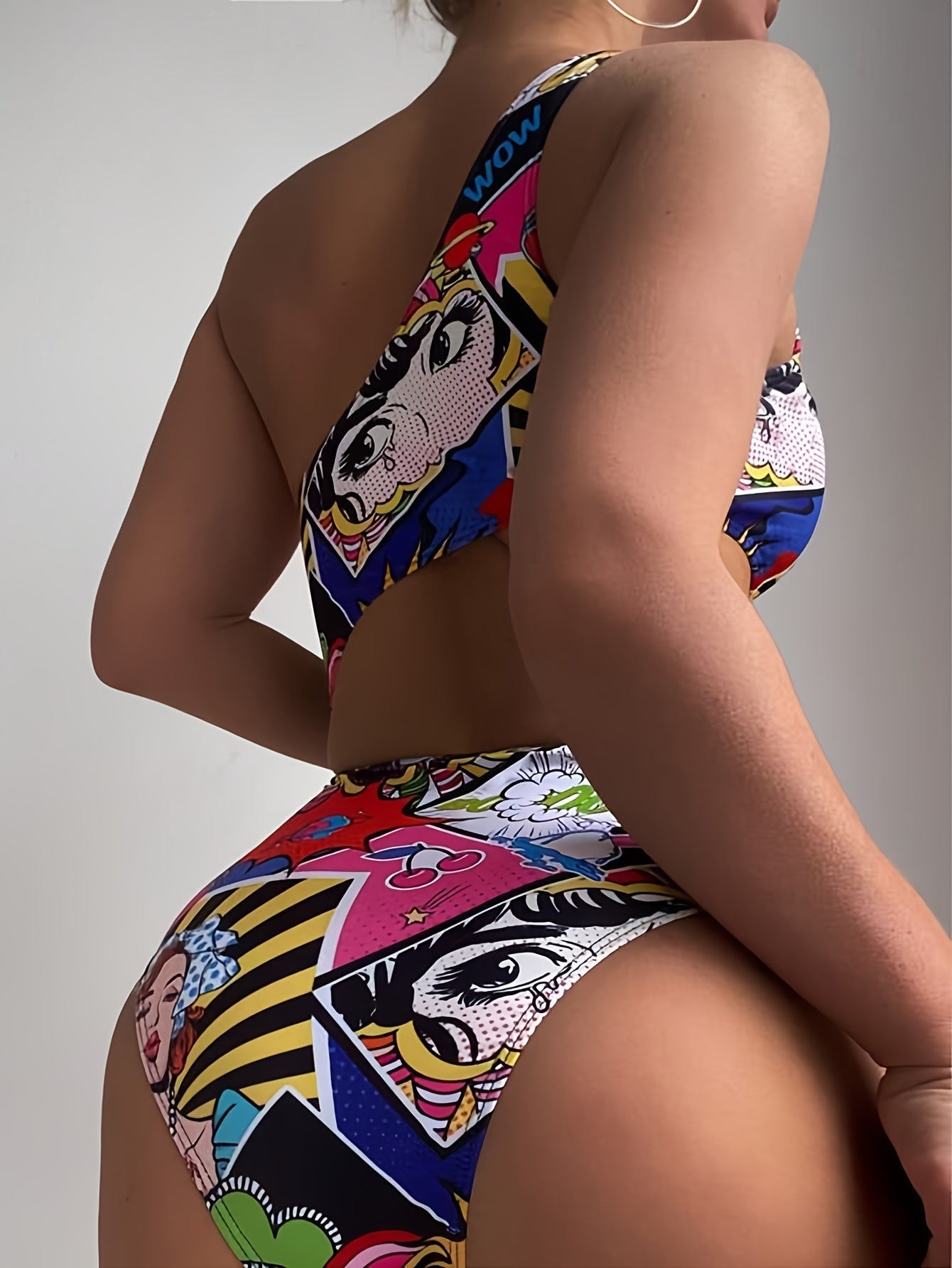 High-Stretch Womens One-piece Swimsuit - Fun Cartoon Comic Prints & Asymmetric Pop Art Design, Unique Cut Out Bathing Suit for a Fashion-Forward Look