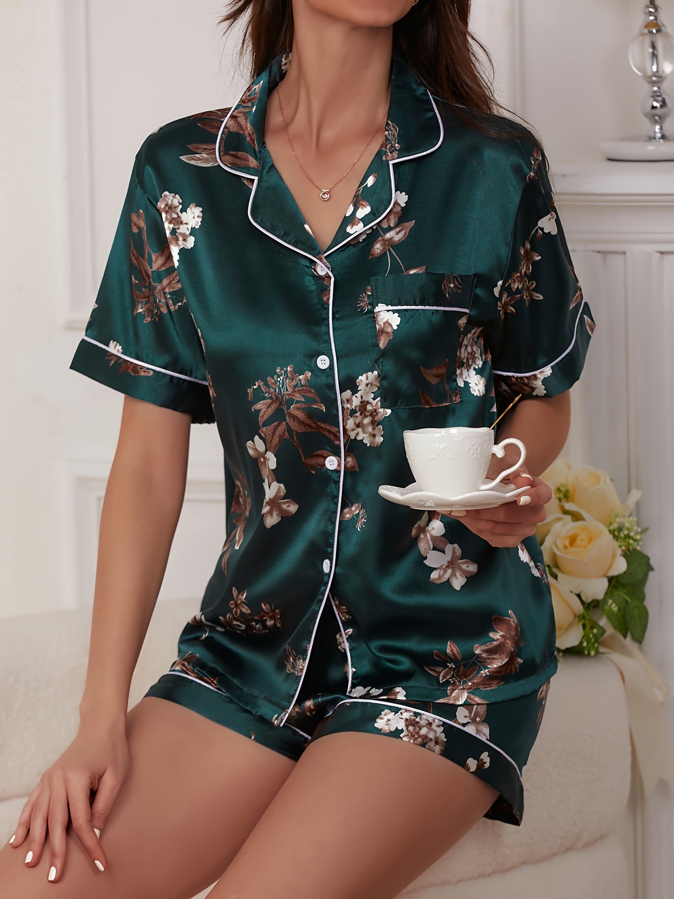 Butterfly printed contrasting satin pajama set, short sleeved top and shorts. Comfort and Leisure