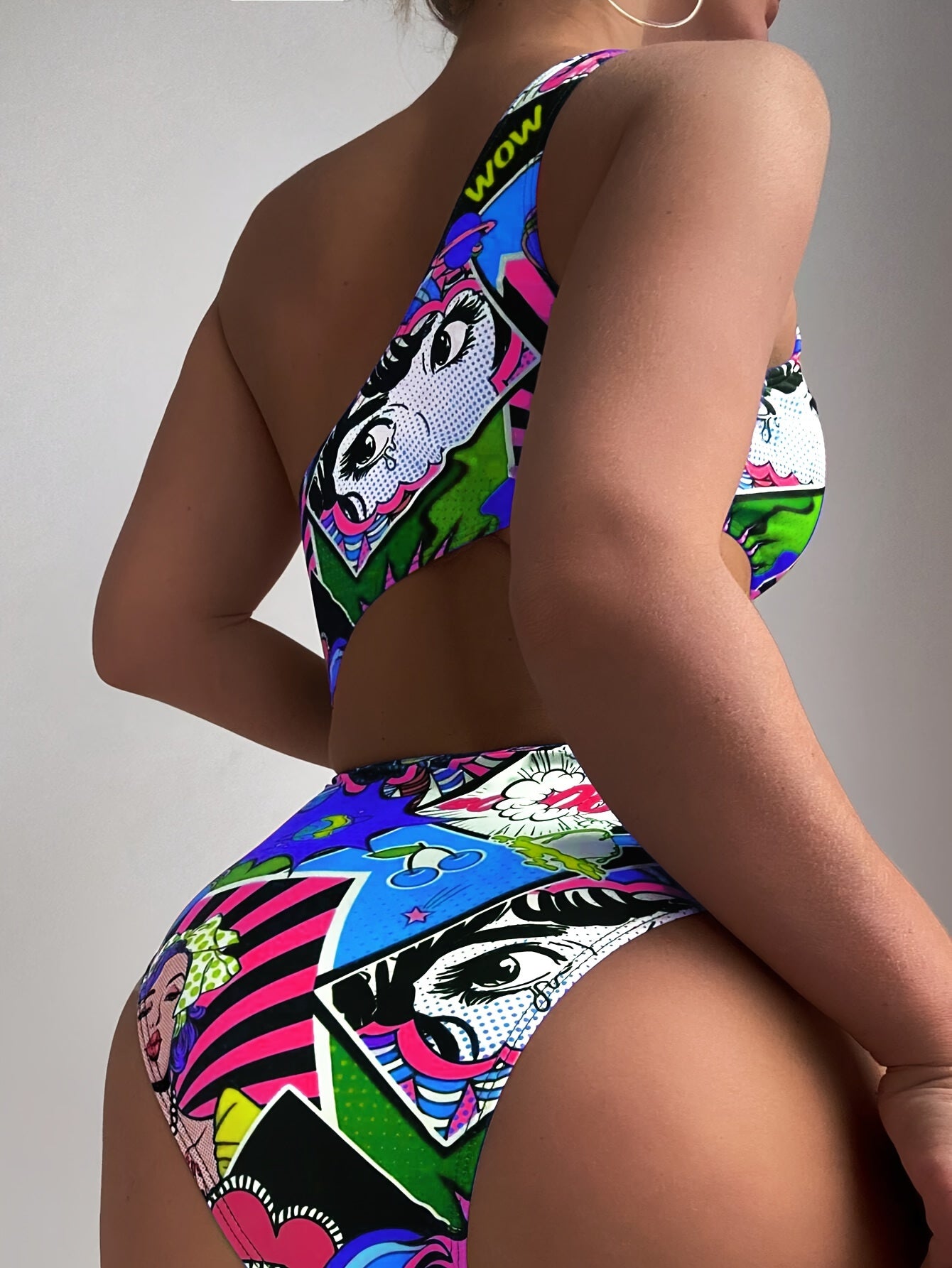 High-Stretch Womens One-piece Swimsuit - Fun Cartoon Comic Prints & Asymmetric Pop Art Design, Unique Cut Out Bathing Suit for a Fashion-Forward Look