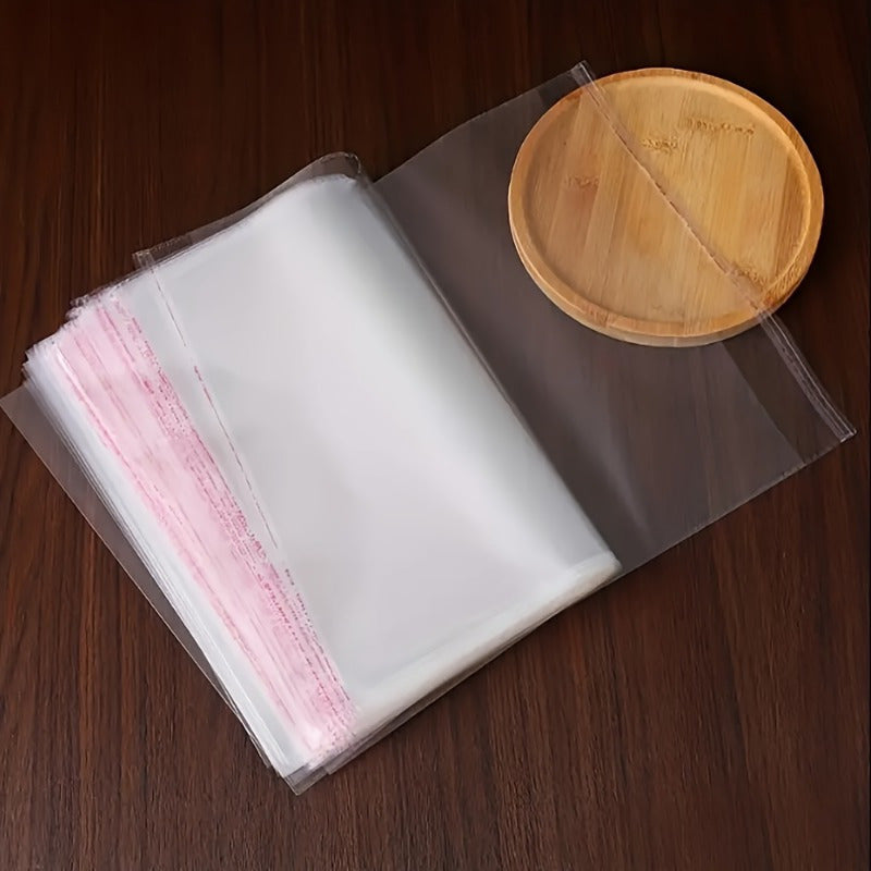 100-Pack Thick Transparent Resealable Cellophane Bags - Self-Adhesive Sealing, Durable OPP BOPP Plastic Packaging for T-Shirts, Photos, Gifts