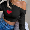 A Stylish Sweater with a Heart Design, Featuring an Elegant Off-Shoulder Look And a Fitted Knit Style.