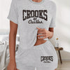 Women'S "Crooks & Castles" Graphic Tee & Shorts Set - Black Casual Summer Outfit with Glittery Letter Print, Polyester, Round Neck, Short Sleeve, Shorts, Casual Wear | Glittery Print Top | Polyester Fabric