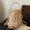 Elegant Striped PU Crossbody Bag with Adjustable Shoulder Strap, Zipper Closure, and Polyester Lining - Trendy Bucket Handbag for Women