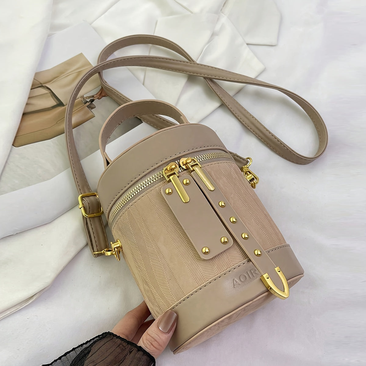 Elegant Striped PU Crossbody Bag with Adjustable Shoulder Strap, Zipper Closure, and Polyester Lining - Trendy Bucket Handbag for Women