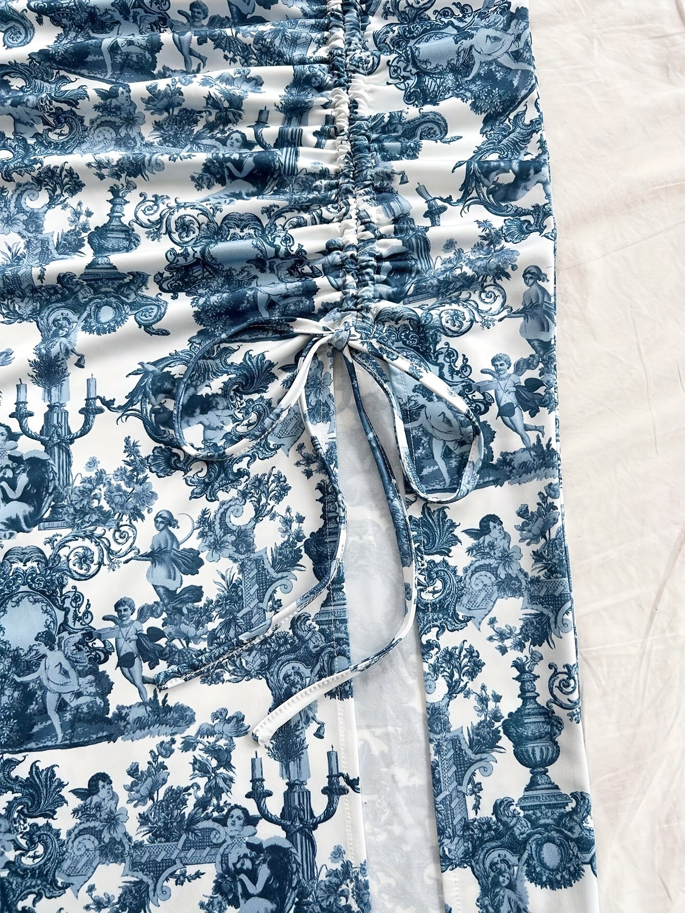 Spring and summer new arrivals: Beach vacation portrait print halter top and side slit skirt.