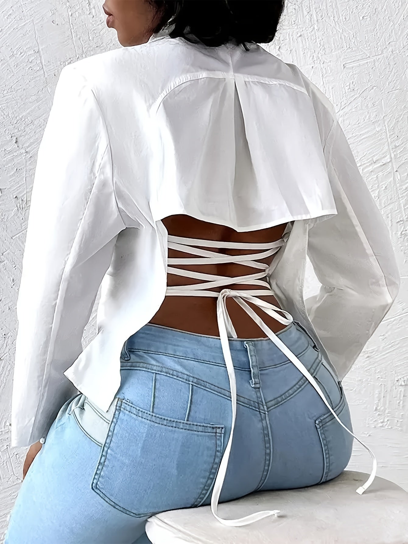 A Stylish And Elegant Long-Sleeve Blazer Top with a Back Tie Design.