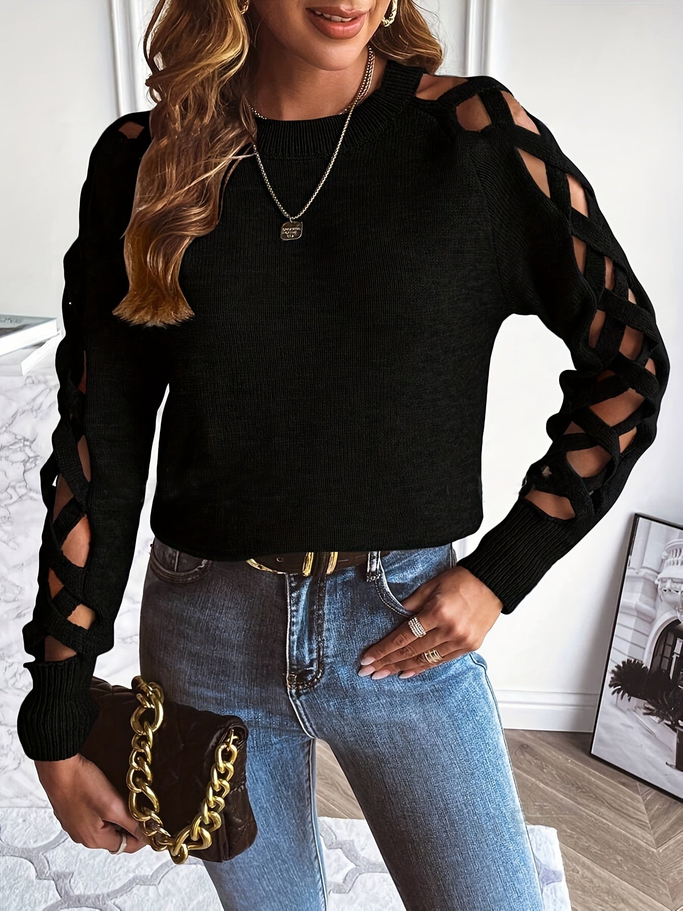 Chic Women's Black Pullover Sweater with Distressed Sleeves - Elegant Cut-Out Detail, Crew Neck, Long Sleeve, High Stretch Nylon/Polyester Blend, Perfect for Autumn Fashion