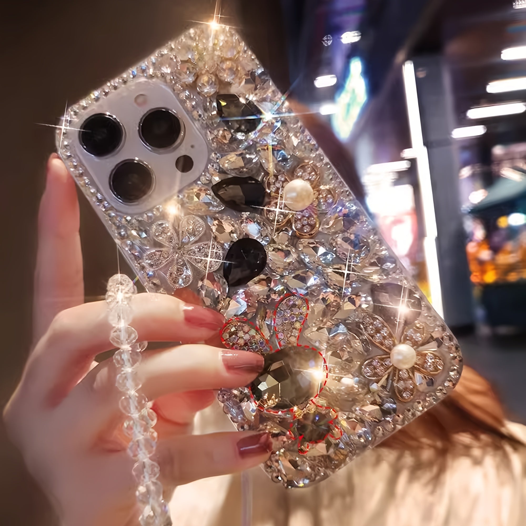 The New Gemstone Bunny Phone Case with a Full Crystal Design And a Crystal Bracelet Is Suitable for The Iphone 16 Pro Max.