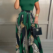 A Fitted Short-Sleeve T-Shirt Paired with Elastic Waist Printed Wide-Leg Pants, Perfect for Summer.