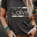 Women's Calvin-Inspired Graphic Tee – Casual Short Sleeve Crew Neck Top in Black, Soft & Stretchy Everyday Shirt