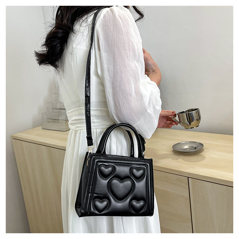 1pc Women’s Stylish Solid Color Handbag with Detachable Strap – Heart Pattern Design, Perfect for Valentine’s Day Gift, Available in Magenta, White, Black, Green, Yellow