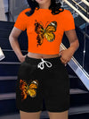 2-Piece Women's Butterfly Print Short-Sleeve Top and Shorts Set - Vibrant Orange & Black Geometric Pattern, Polyester Blend, Casual Spring/Summer Outfit, Spring Casual Wear | Vibrant Fashion | Smooth Texture Finish