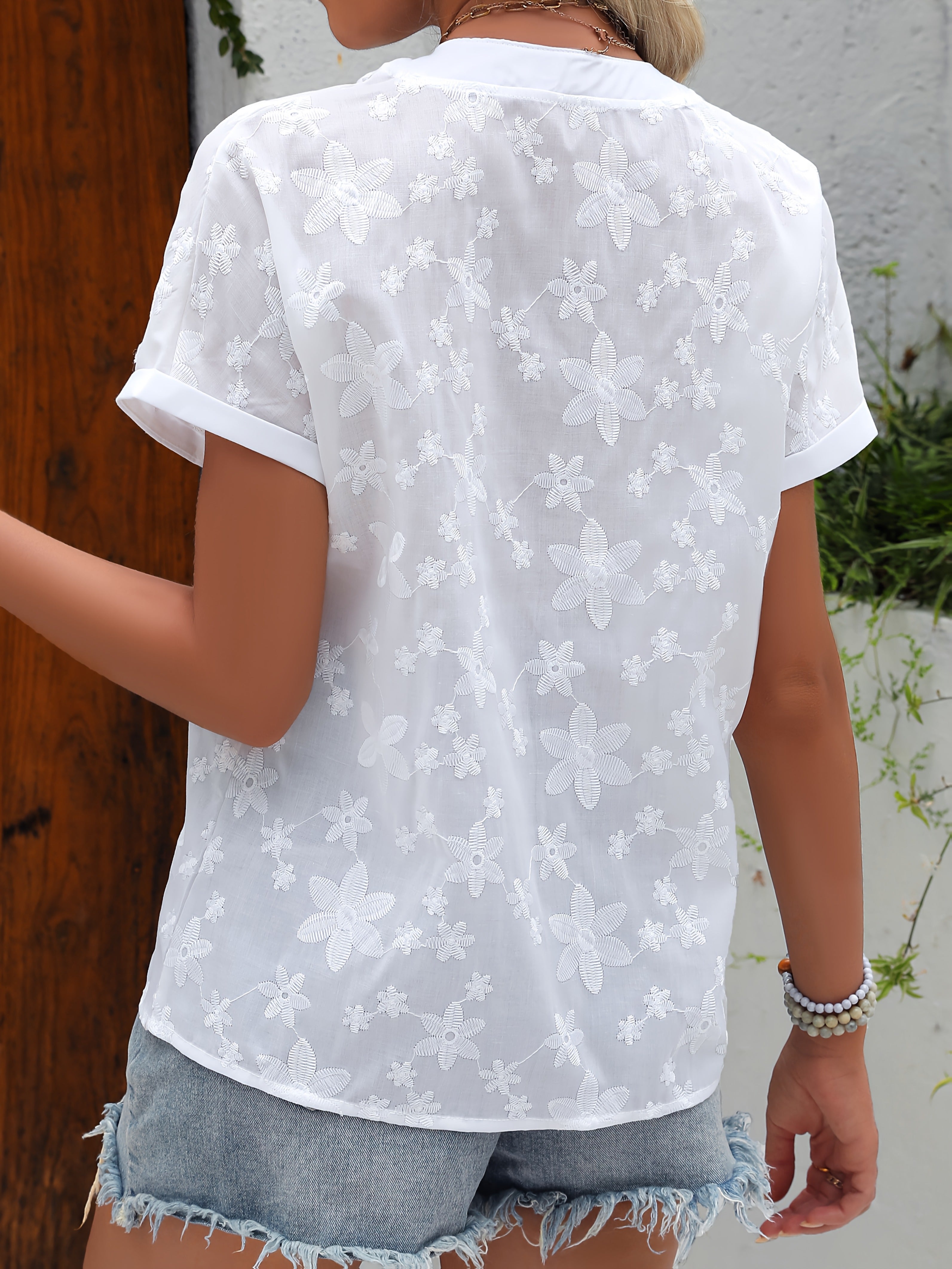 Women'S Loose White Shirt with a Summer Floral Pattern And a V-Neck Batwing Sleeve Design.