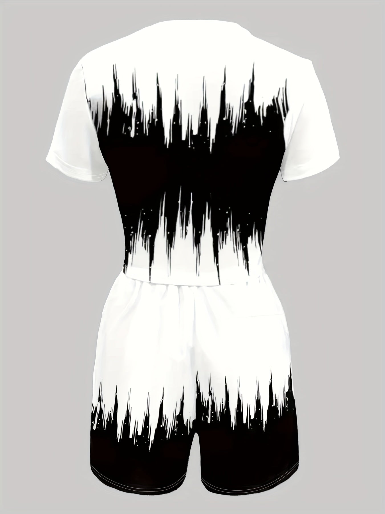 A Stylish Two-Piece Set for Women Featuring a Short-Sleeve Top with a Gradient Letter Pattern And Matching Shorts.