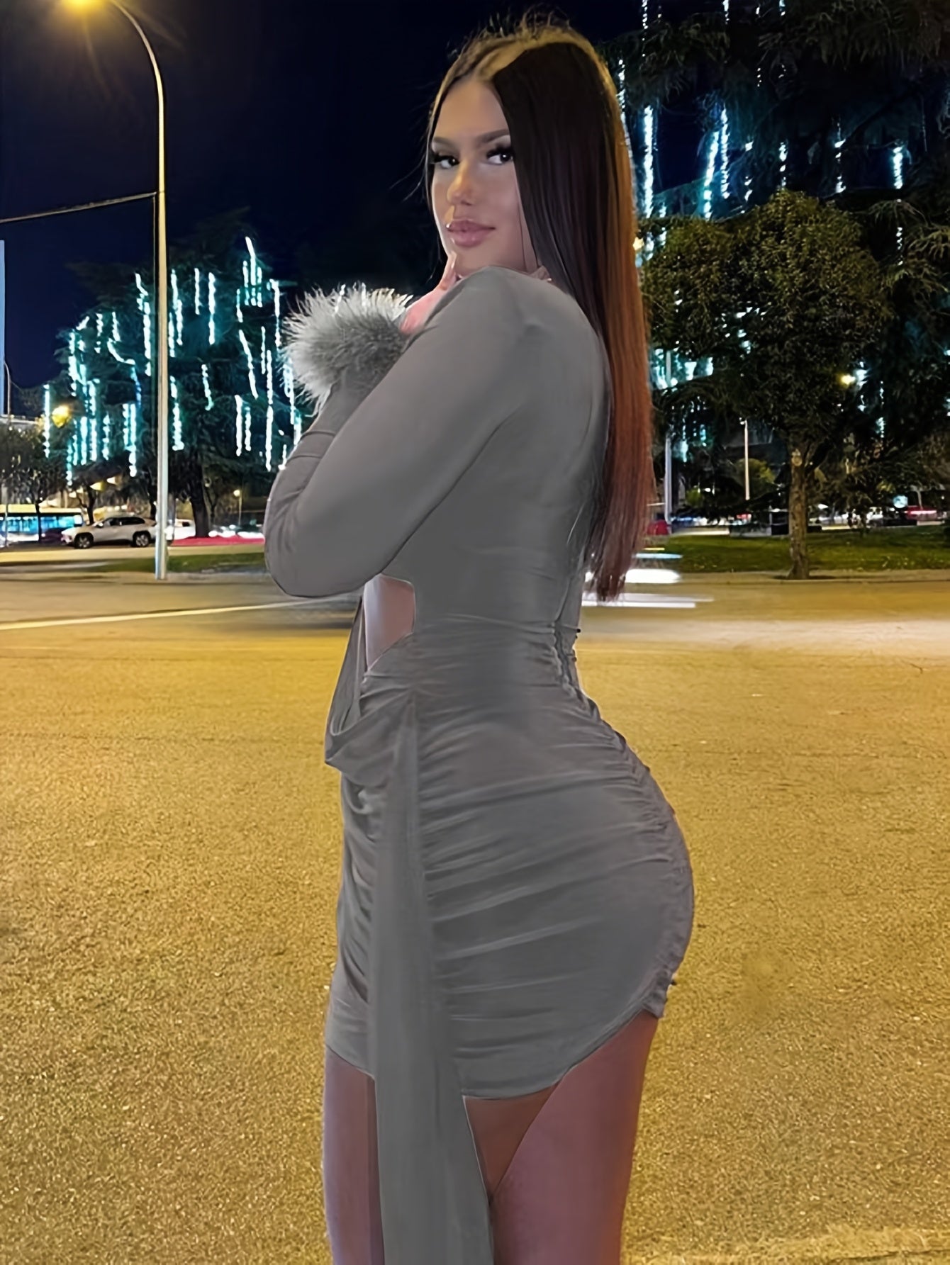 Fall Figure-Hugging Mini Dress Featuring Fuzzy Cuff Accents And a Cutout Design.
