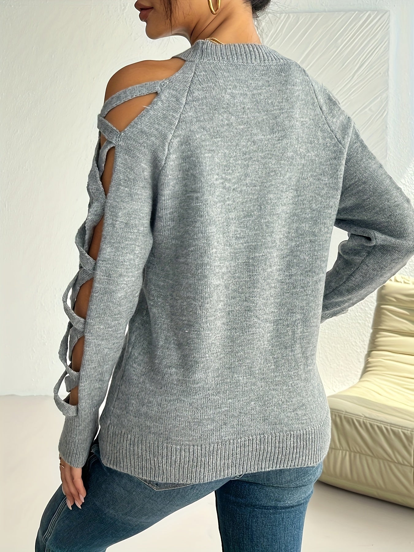 Chic Women's Black Pullover Sweater with Distressed Sleeves - Elegant Cut-Out Detail, Crew Neck, Long Sleeve, High Stretch Nylon/Polyester Blend, Perfect for Autumn Fashion
