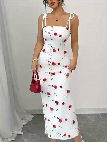 A Simple, Fitted Long Dress with Thin Shoulder Straps And a Waist Belt.