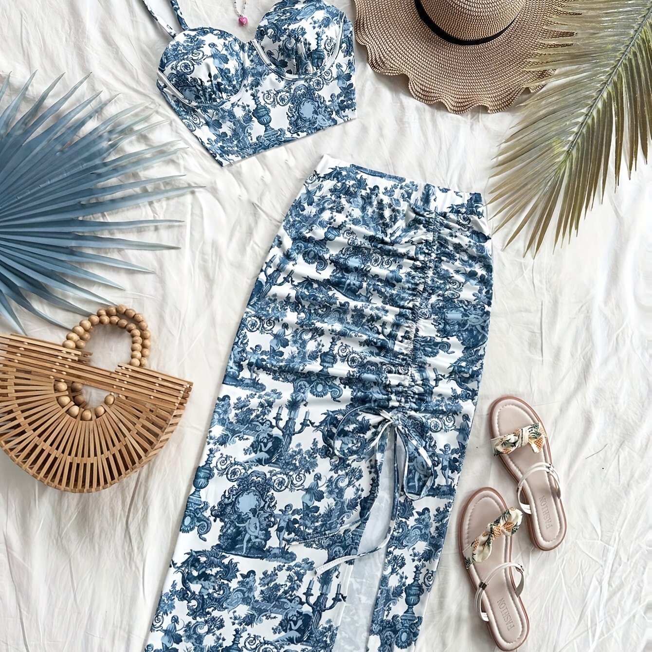 Spring and summer new arrivals: Beach vacation portrait print halter top and side slit skirt.