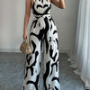 Women's Elegant Off-Shoulder Print Jumpsuit with Wide Legs and Tie Waist - Black & White Abstract Pattern, Polyester Fabric, Perfect for Vacation and Everyday Chic