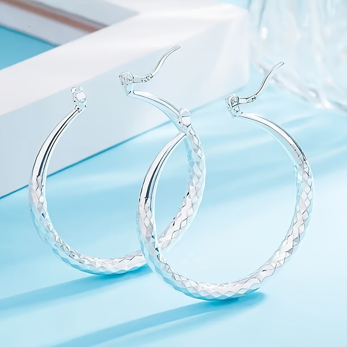 A Pair Of Exquisite Large Circle Earrings, An Elegant Ladies' Accessory In A Luxury Style, Perfect For Women To Wear On A Daily Basis.