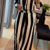 A Two-Piece Set Featuring a Stylish Black And White Striped Shirt with Button Pocket Design And Wide-Leg Pants for Autumn Leisure.