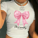 Women's Light Blue Casual Short Top with Pink Bow & "She Deserves" Proverb 13:9 Print - Soft Short Sleeve Summer Blouse for Casual Attire