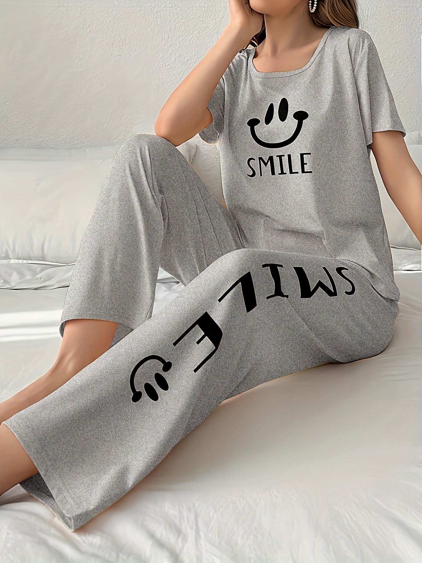 Women's Smiling Face & Letter Print Casual Pajama Set, Short Sleeve Round Neck Top & Pants, Comfortable Relaxed Fit