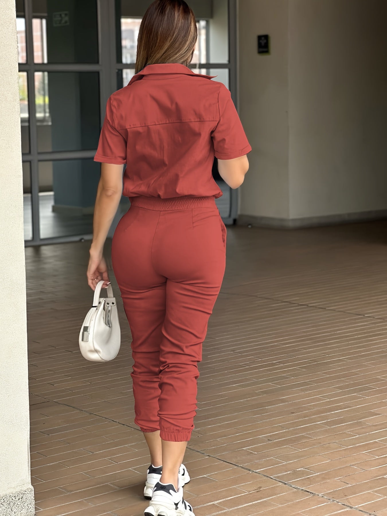 Ladies' Casual V-Neck Pocket Jumpsuit with Button Closure and Cuffed Ankle Pants