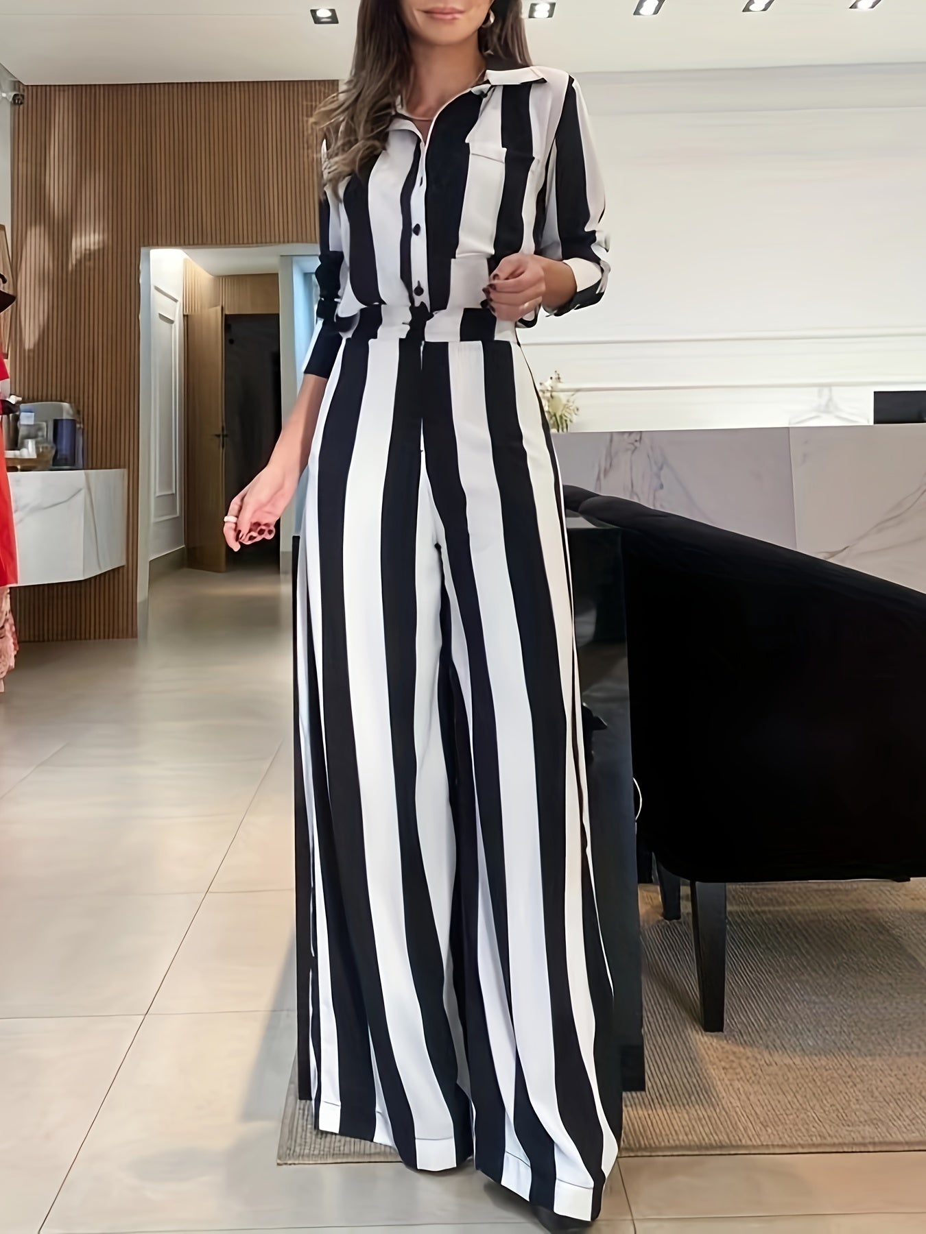 A Two-Piece Set Featuring a Stylish Black And White Striped Shirt with Button Pocket Design And Wide-Leg Pants for Autumn Leisure.