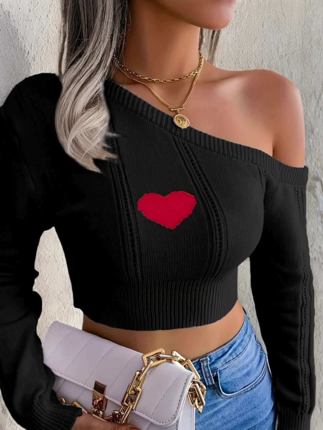 A Stylish Sweater with a Heart Design, Featuring an Elegant Off-Shoulder Look And a Fitted Knit Style.