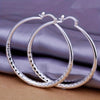 A Pair Of Exquisite Large Circle Earrings, An Elegant Ladies' Accessory In A Luxury Style, Perfect For Women To Wear On A Daily Basis.