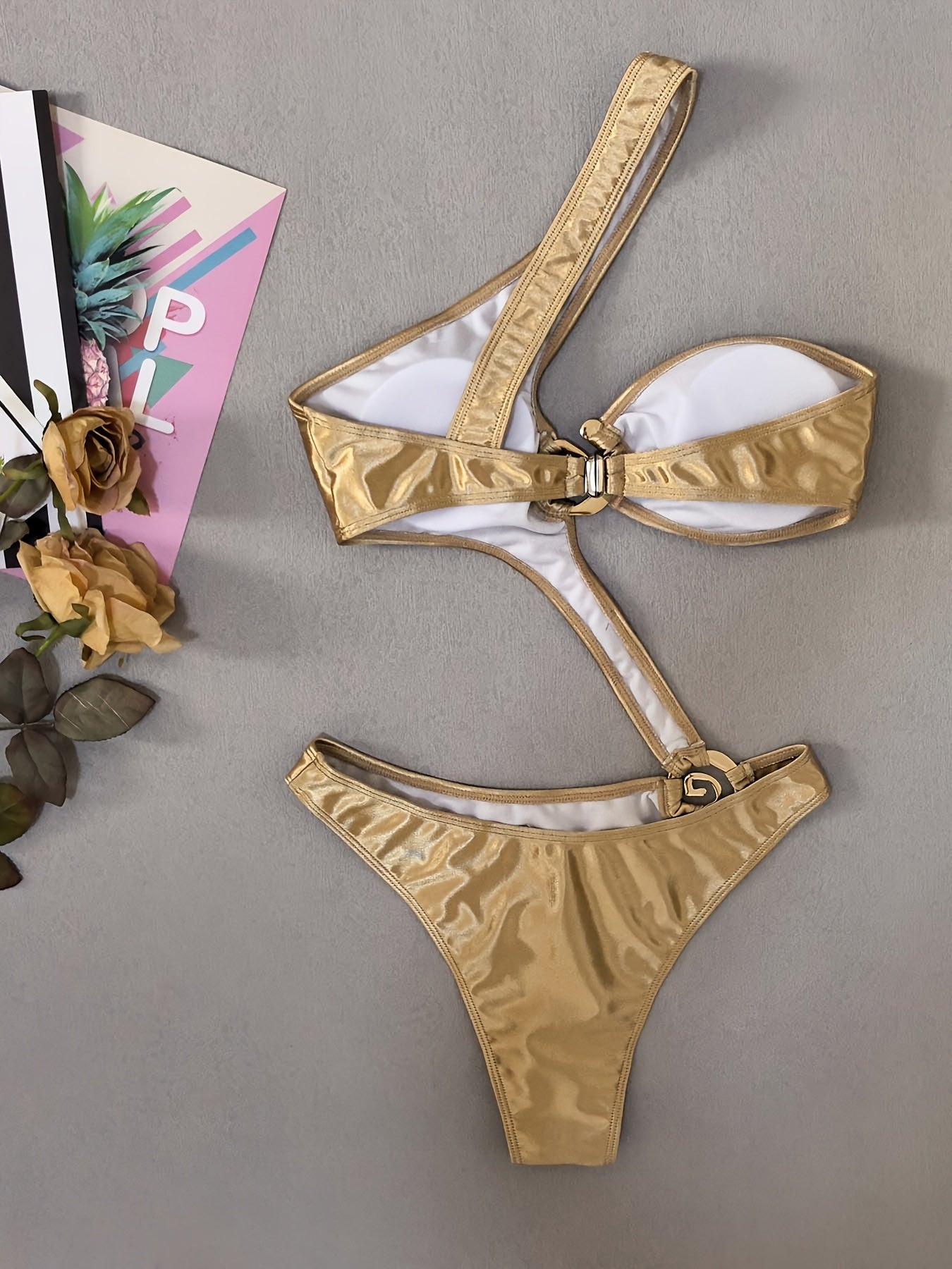 Golden Metallic Ring-Linked One-Piece Swimsuit for Women - Sexy High-Stretch Bikini with Asymmetrical Design, Glossy Finish, and Built-In Bra Pad