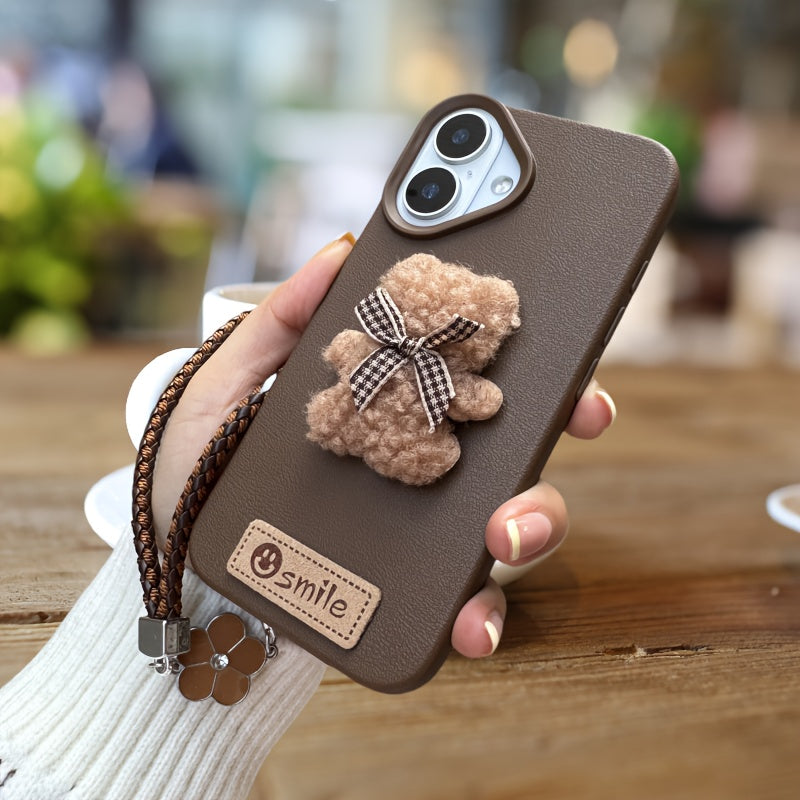 A Single-Pack Plush Teddy Bear Phone Case with a Bow, Available in White And Brown. It Comes with a Wrist Strap And Features a Simple And Elegant Faux Leather Texture That Is Anti-Slip And Fingerprint-Resistant. Made with TPU