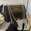 Elegant Mini Messenger Bag for Women: Magnetic Closure, Scallop Design, Chain Strap, Faux Leather Lining, Solid Color