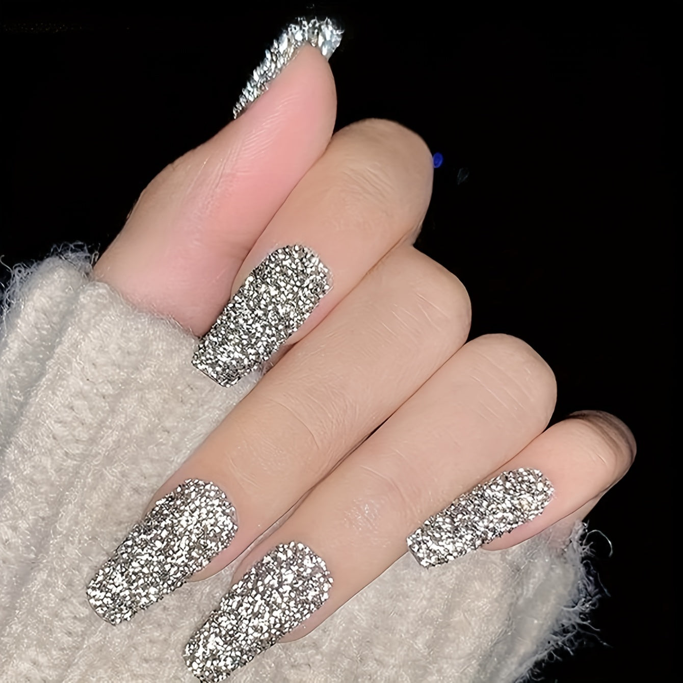 A Box of Tiny Silvery Triangular 3D Glittering Rhinestones, Perfect for Parties, Nightclubs, Music Festivals, And Vacation Nail Art Accessories.
