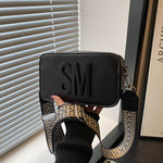 Stylish Crossbody Bag with Wide Strap – Trendy Solid Color Shoulder Bag Featuring Bold "SM" Letter Design, Zip Closure, and Polyester Lining – Available in Coffee Brown, Light Brown, Magenta, White, Red, Green, Black, Sma