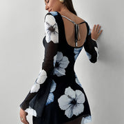 A Mini Dress with a Floral Print That Is Sexy And Elegant, Featuring a Backless Design And Breathable Long Sleeves.