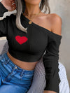 A Stylish Sweater with a Heart Design, Featuring an Elegant Off-Shoulder Look And a Fitted Knit Style.
