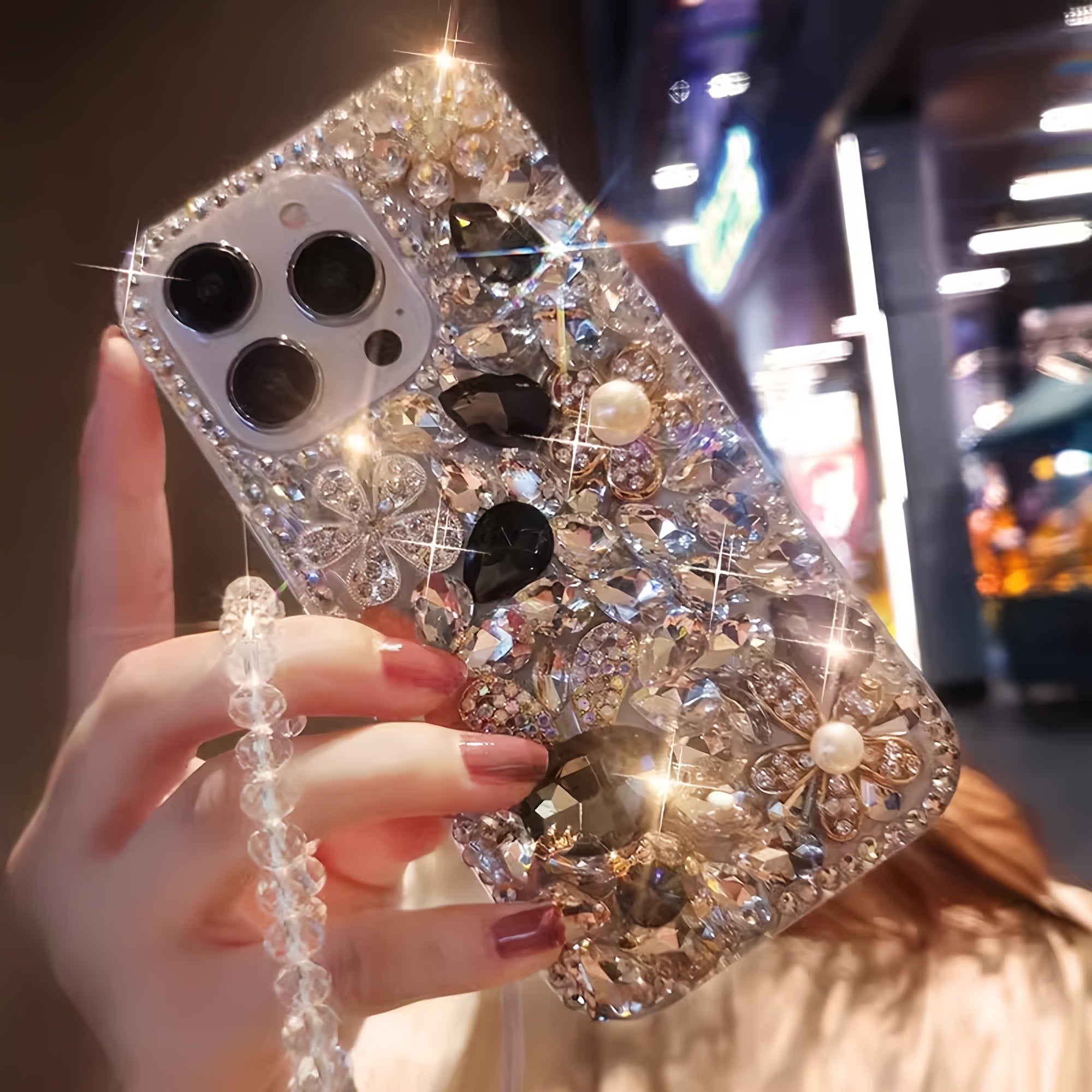 The New Gemstone Bunny Phone Case with a Full Crystal Design And a Crystal Bracelet Is Suitable for The Iphone 16 Pro Max.