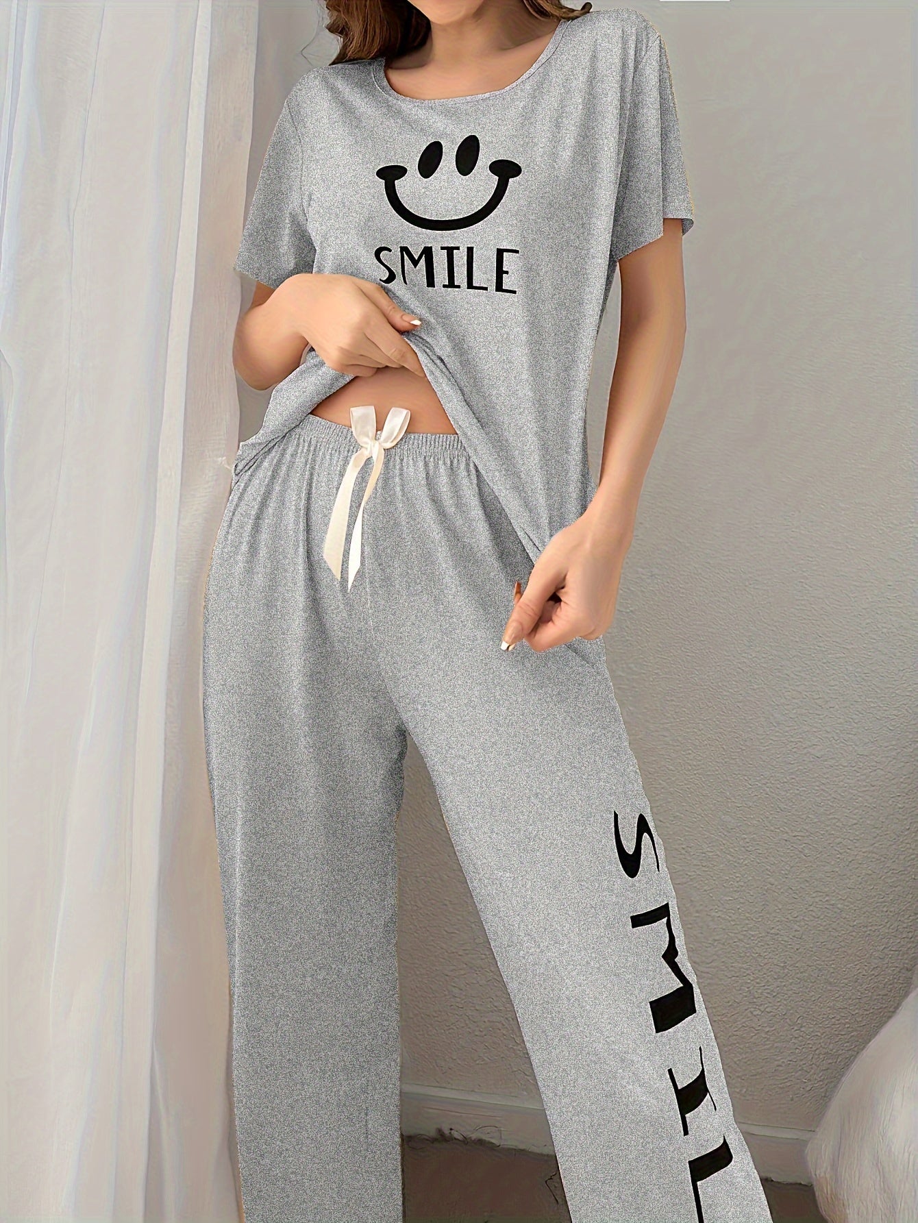 Women's Smiling Face & Letter Print Casual Pajama Set, Short Sleeve Round Neck Top & Pants, Comfortable Relaxed Fit