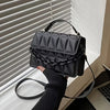 Fashionable Mini Embossed Crossbody Bag for Women - Stylish Pure Black Shoulder Bag with Magnetic Closure.
