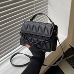 Fashionable Mini Embossed Crossbody Bag for Women - Stylish Pure Black Shoulder Bag with Magnetic Closure.