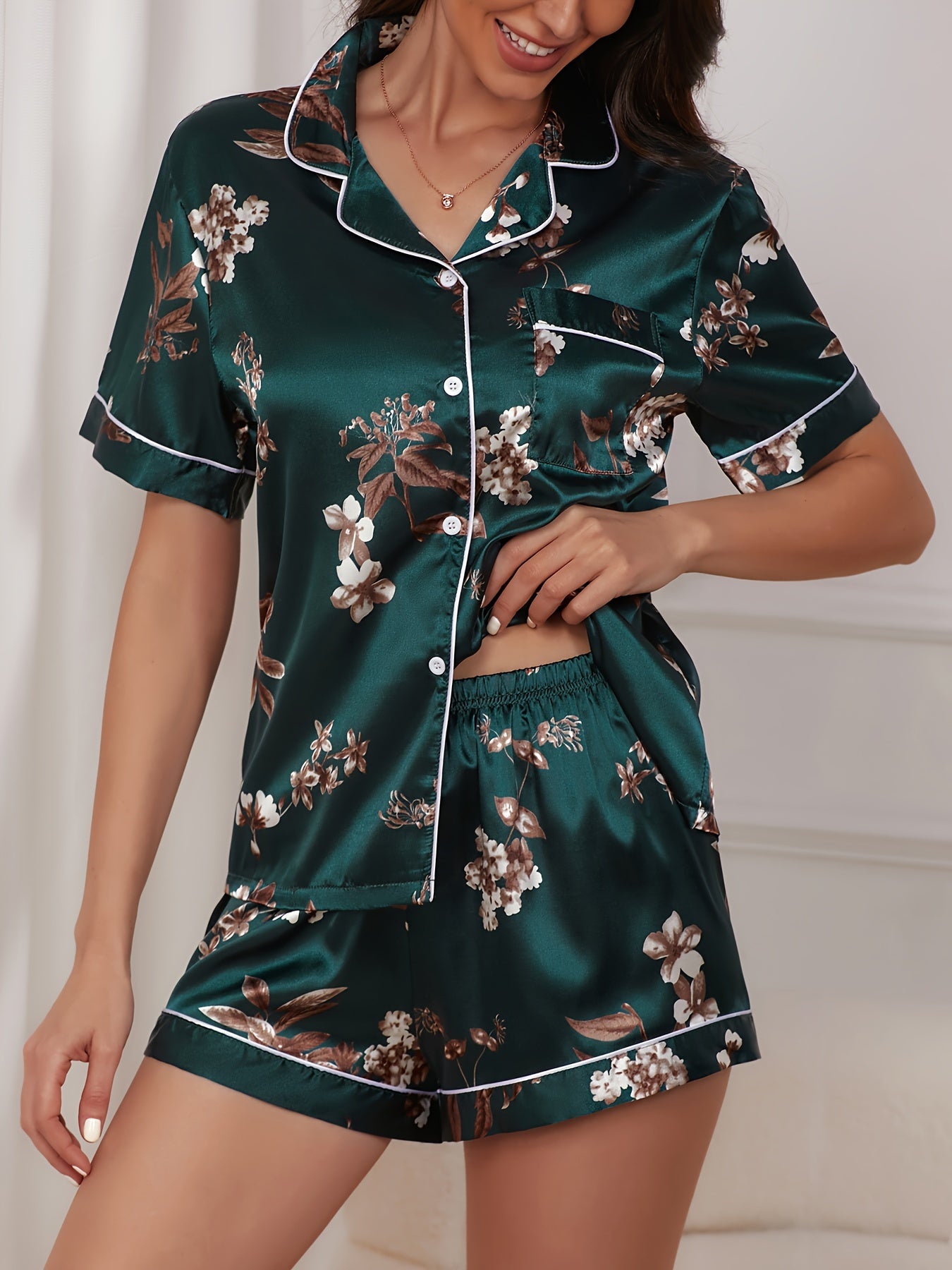 Butterfly printed contrasting satin pajama set, short sleeved top and shorts. Comfort and Leisure