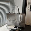 Stylish Black Tote Bag with "TOTE BAG" Embossed Design – Large Capacity Shoulder Handbag for Women, Perfect for Commuting and Casual Outings, Snap Button Closure